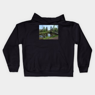 Trees and water frozen in time Kids Hoodie